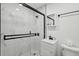 Sleek bathroom with glass shower, white tile, and modern vanity at 215 Piedmont Ne Ave # 2201, Atlanta, GA 30308