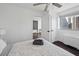 Bedroom with a modern ceiling fan, comfortable bed, and views of the city at 215 Piedmont Ne Ave # 2201, Atlanta, GA 30308