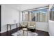 Bedroom features hardwood floors, area rug, with plenty of natural light at 215 Piedmont Ne Ave # 2201, Atlanta, GA 30308