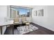 Bedroom features hardwood floors, area rug, with plenty of natural light at 215 Piedmont Ne Ave # 2201, Atlanta, GA 30308