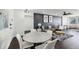 Spacious living room with hardwood floors, neutral colors, and a dining area at 215 Piedmont Ne Ave # 2201, Atlanta, GA 30308