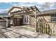 View of a weathered back deck with pergola, screened porch, and access to backyard at 4833 Village North Ct, Atlanta, GA 30338