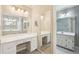 Bathroom featuring a double sink vanity, dressing table and mirror at 4833 Village North Ct, Atlanta, GA 30338