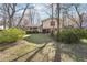Inviting home with large front yard and mature trees at 4833 Village North Ct, Atlanta, GA 30338