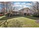 Beautiful home with manicured lawn and well-kept landscaping at 4833 Village North Ct, Atlanta, GA 30338