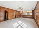 Open floor plan leading from carpeted living room into kitchen at 4833 Village North Ct, Atlanta, GA 30338