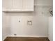 Laundry room with white cabinetry at 105 Creekwood Ln, Fayetteville, GA 30214