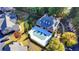 Aerial shot of clubhouse with fenced pool, mature landscaping, and surrounding residential properties at 1535 Duluth Hwy # 1001, Lawrenceville, GA 30043
