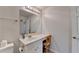 Bathroom with white vanity, large mirror, and attractive fixtures at 1535 Duluth Hwy # 1001, Lawrenceville, GA 30043