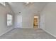Spacious bedroom with neutral carpet and ensuite bathroom entrance at 1535 Duluth Hwy # 1001, Lawrenceville, GA 30043