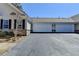 Attached garage with a paved driveway for easy access and convenience at 1535 Duluth Hwy # 1001, Lawrenceville, GA 30043