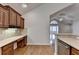 This kitchen has granite counters, wood cabinets, and a convenient desk area at 1535 Duluth Hwy # 1001, Lawrenceville, GA 30043
