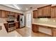 Modern kitchen features stainless steel appliances, wood cabinets, and sleek countertops at 1535 Duluth Hwy # 1001, Lawrenceville, GA 30043
