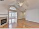 Inviting living room with a cozy fireplace, gleaming hardwood floors, and plenty of natural light at 1535 Duluth Hwy # 1001, Lawrenceville, GA 30043