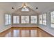 Light-filled sunroom with hardwood floors and large windows offering serene views at 1535 Duluth Hwy # 1001, Lawrenceville, GA 30043