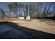 Large backyard with mature trees and storage shed at 2811 Birchwood Sw Ct, Marietta, GA 30060