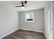Cozy bedroom with new floors, fresh paint, and ceiling fan at 2811 Birchwood Sw Ct, Marietta, GA 30060