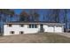 Charming one-story home features a brick facade, a two-car garage, and a well-maintained front lawn at 2811 Birchwood Sw Ct, Marietta, GA 30060