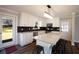 Modern kitchen with an island, white cabinets, and stainless steel appliances at 2811 Birchwood Sw Ct, Marietta, GA 30060