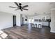Spacious open-concept living and kitchen area features stainless appliances, updated cabinets, and island with bar seating at 2811 Birchwood Sw Ct, Marietta, GA 30060