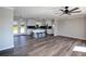 Bright open-concept living and kitchen area features modern cabinets and new flooring at 2811 Birchwood Sw Ct, Marietta, GA 30060
