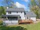 Picture of a screened porch and wood deck overlooking a lush, private backyard at 3040 Wax Wing Nw Ct, Kennesaw, GA 30144