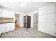 Spacious kitchen featuring stainless steel refrigerator and white cabinetry at 3040 Wax Wing Nw Ct, Kennesaw, GA 30144
