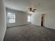 Spacious main bedroom with natural light and ceiling fan at 358 Azalea Cir, Cumming, GA 30040