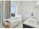 Elegant bathroom featuring a soaking tub, shower, and modern fixtures at 1200 Ponce De Leon Ne Ave # A1, Atlanta, GA 30306