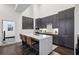 Sleek kitchen with island, modern cabinets, and stainless steel appliances at 1200 Ponce De Leon Ne Ave # A1, Atlanta, GA 30306