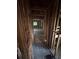 Hallway featuring exposed framing, hardwood floors and an air vent awaiting remodeling at 1713 Cahoon St, Atlanta, GA 30310