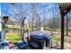 Relaxing backyard featuring a hot tub and a spacious yard at 52 Newman Dr, Villa Rica, GA 30180