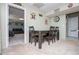 Open basement space with tile and carpet, features a dining area and a rec room at 52 Newman Dr, Villa Rica, GA 30180