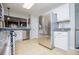 A fully-equipped kitchen with stainless steel appliances, modern cabinetry, and great functionality at 52 Newman Dr, Villa Rica, GA 30180