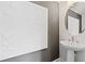 Modern powder room with pedestal sink and stylish decorative wall art at 2581 Astaire Ct, Atlanta, GA 30318
