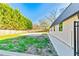Spacious backyard showcasing a tennis court area at 5241 Moon Rd, Powder Springs, GA 30127