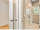 Contemporary bathroom with tiled shower, glass door, and built-in bench seating at 5241 Moon Rd, Powder Springs, GA 30127
