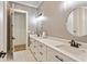 Modern bathroom featuring double sinks, marble countertops, and matte black hardware at 5241 Moon Rd, Powder Springs, GA 30127