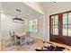 Dining room with a modern farmhouse chandelier at 5241 Moon Rd, Powder Springs, GA 30127