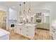 Open kitchen featuring a center island with seating and stainless steel appliances at 5241 Moon Rd, Powder Springs, GA 30127