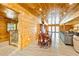 Open concept living room with dining area and view of shower with glass door at 5241 Moon Rd, Powder Springs, GA 30127