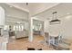 Open concept floor plan with hardwood floors, lots of natural light, and designer fixtures at 5241 Moon Rd, Powder Springs, GA 30127