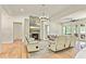 Spacious living room with stone fireplace, hardwood floors, and neutral color palette at 5241 Moon Rd, Powder Springs, GA 30127