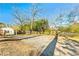 Spacious gravel parking area in front of a modern barn-style building with well-maintained fencing at 5241 Moon Rd, Powder Springs, GA 30127