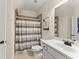 Bathroom featuring a shower with a shower curtain and a modern vanity at 6040 Boulder Bluff Dr, Cumming, GA 30040