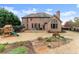 Brick home with a patio, play structure, and lush lawn in a spacious backyard at 6040 Boulder Bluff Dr, Cumming, GA 30040