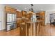 Kitchen with custom wood cabinets, stainless steel appliances, and granite countertops at 6040 Boulder Bluff Dr, Cumming, GA 30040