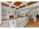 Living room with coffered ceilings, built-in bookshelves, and a fireplace at 6040 Boulder Bluff Dr, Cumming, GA 30040