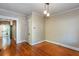 Traditional dining room featuring hardwood floors and elegant lighting fixtures at 746 United Se Ave, Atlanta, GA 30312