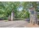 Stone pillars mark the entrance to Grant Park, surrounded by mature trees at 746 United Se Ave, Atlanta, GA 30312